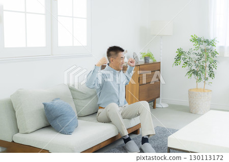 Senior men playing guts pose 130113172