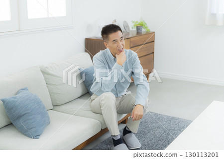Senior man with arms folded Senior man with arms folded 130113201
