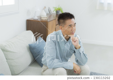 Senior man with arms folded 130113202