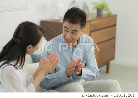 Senior couple in the living room Senior couple in the living room 130113261