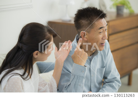 Senior couple in the living room Senior couple in the living room 130113263