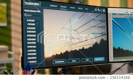 Digital modeling tool on computer used for smart electric grid development in engineering office. CAD software on PC used to work on upgrading high voltage transmission tower 130114108