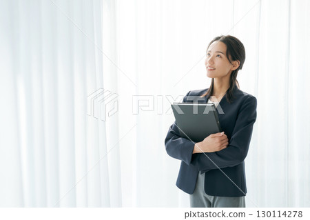 Portrait of a working woman in a suit Portrait of a working woman in a suit 130114278