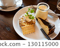 Assorted dessert plate of tarts, cheesecake, and pudding 130115000