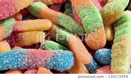 Delight in the vibrant, colorful, and sugarcoated candy sticks perfect for sweet indulgence 130115959