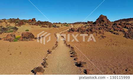 This is a stunning scenic desert pathway that winds beautifully through rocky terrain This is a stunning scenic desert pathway that winds beautifully through rocky terrain 130115999