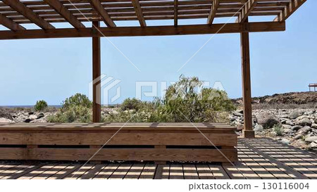 This Scenic Outdoor Wooden Pavilion Offers a Breathtaking View Overlooking a Rocky Landscape This Scenic Outdoor Wooden Pavilion Offers a Breathtaking View Overlooking a Rocky Landscape 130116004