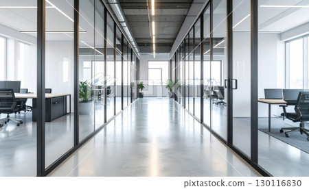 The clean, empty, and modern office corridor's glass walls reflect the light of the architectural hallway The clean, empty, and modern office corridor's glass walls reflect the light of the architectural hallway 130116830