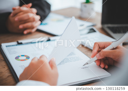 businessman is negotiating, advising, and explaining the matter of the contract to be agreed to sign the contract. businessman is negotiating, advising, and explaining the matter of the contract to be agreed to sign the contract. 130118259