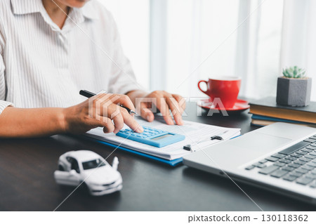 Concept of automobile ownership involves managing expenses such as insurance, tax, and loan payments, making car finance a key part of personal saving and financial planning in today economy. 130118362