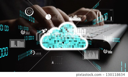 Close-up of Hands Typing on Keyboard with Cloud Computing Graphics and Digital Data Representation to Illustrate Modern Technology Concepts xenic 130118634