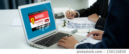 Virus warning alert on computer screen detected brisk cyber threat Virus warning alert on computer screen detected brisk cyber threat 130118830