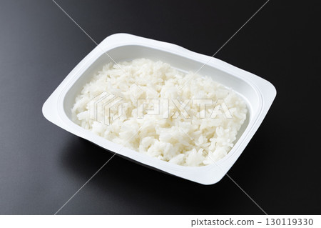 Packed rice on a black background 130119330