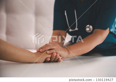Hand and deep empathy, doctor offers medicine, support and hope to every patient, building trust through compassionate health care in clinic, hospital setting true care and medicals restore health. 130119427