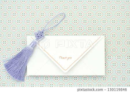 Knot and thank you envelope on a modern and elegant pattern background 130119846