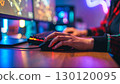 Player using a gaming mouse and keyboard 130120095