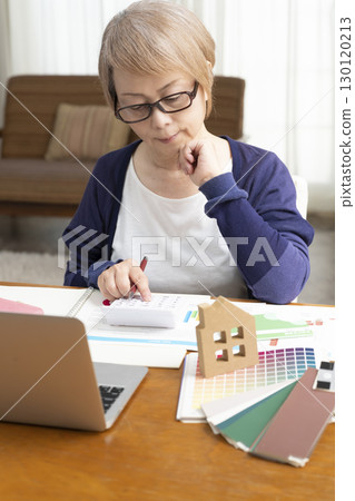 Senior women thinking about renovating their homes and starting their second life 130120213