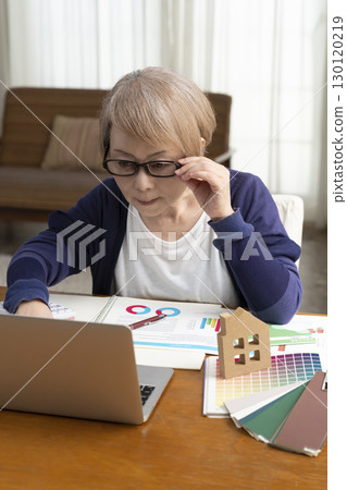 Senior women thinking about renovating their homes and starting their second life Senior women thinking about renovating their homes and starting their second life 130120219