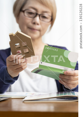 Senior women thinking about renovating their homes and starting their second life 130120228
