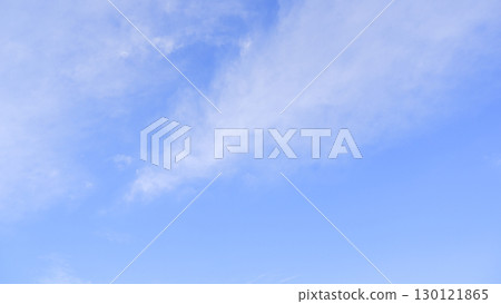 Bright Blue Sky with Thin White Clouds 130121865
