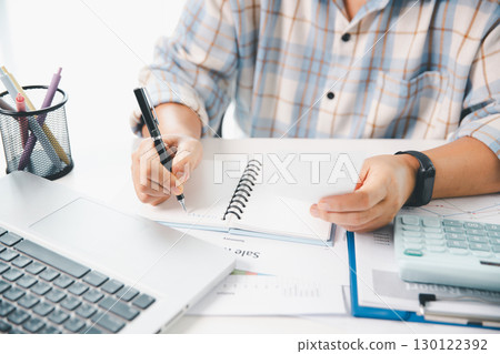 Woman calculating monthly home expenses, taxes, bank account balance and credit card bills payment, Income is not enough for expenses. financial planning, business calculate tax, investment finance. Woman calculating monthly home expenses, taxes, bank account balance and credit card bills payment, Income is not enough for expenses. financial planning, business calculate tax, investment finance. 130122392