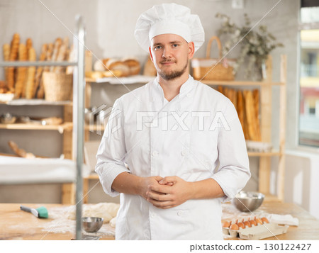 Portrait of professional male baker in uniform in bakery 130122427
