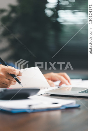 Consultant facilitates consultation between bookkeepers, lawyer to review accounting balance sheet, stock market statistics, yearly tax obligations, ensuring business is protected from bribery, law. Consultant facilitates consultation between bookkeepers, lawyer to review accounting balance sheet, stock market statistics, yearly tax obligations, ensuring business is protected from bribery, law. 130124171