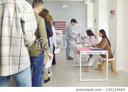 American voters standing in line at the polling station during the election in the USA 130124664
