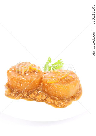Daikon radish with minced meat and thick sauce, cuisine, bright background Daikon radish with minced meat and thick sauce, cuisine, bright background 130125109