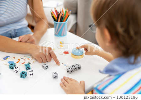 Child Learning with Alphabet Blocks and Flashcards at Home Child Learning with Alphabet Blocks and Flashcards at Home 130125186