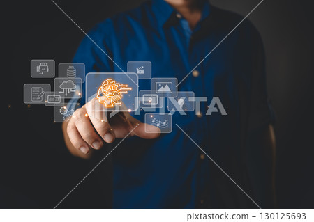 A man touches the AI icon and uses a smartphone, focusing on research, content analysis, and creation. Marketers develop video streaming strategies and online marketing to grow their digital business. 130125693