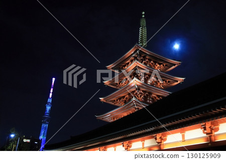 The five-story pagoda and Tokyo Skytree illuminated by the hazy moon: night view of Sensoji Temple The five-story pagoda and Tokyo Skytree illuminated by the hazy moon: night view of Sensoji Temple 130125909