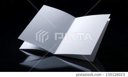 Blank open booklet with white pages on reflective surface, minimalistic design with soft lighting creating calm and clean atmosphere Blank open booklet with white pages on reflective surface, minimalistic design with soft lighting creating calm and clean atmosphere 130126023
