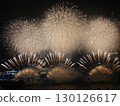 Fireworks dancing in the night sky 130126617
