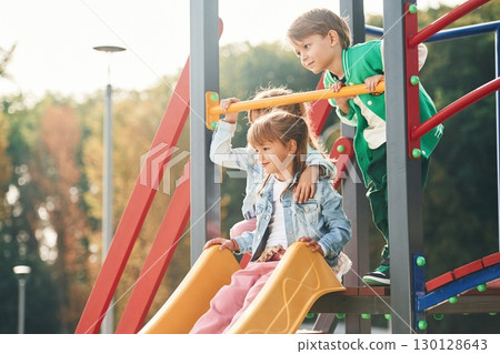 On the playground. Kids are having fun together 130128643