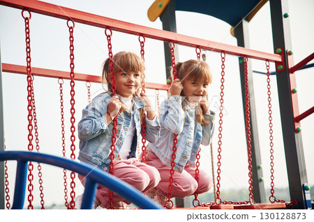 Positive emotions. Kids are having fun on the playground Positive emotions. Kids are having fun on the playground 130128873