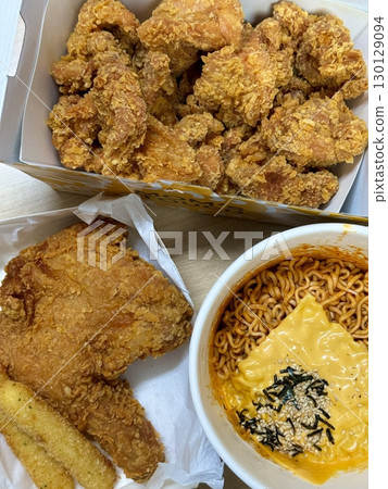 Crispy Korean fried chicken with sweet and spicy glaze paired with fiery buldakmyeon noodles, offering a perfect explosion of bold heat, rich flavor, and satisfying crunch in every bite. 130129094