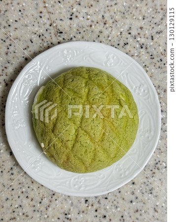 Melon Ppang, a fluffy Korean bread shaped like a melon with a crisp, sugary top layer. Popular for its sweet flavor and unique look, it's a delightful treat perfect for snacks or desserts. Melon Ppang, a fluffy Korean bread shaped like a melon with a crisp, sugary top layer. Popular for its sweet flavor and unique look, it's a delightful treat perfect for snacks or desserts. 130129115