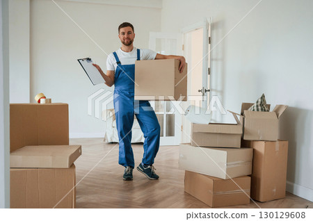 Room full of boxes. Moving service employee 130129608