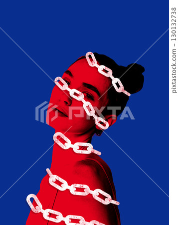 Creative collage. Woman wrapped in heavy chains with sad emotion on blue background 130132738