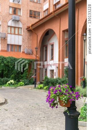 Beautiful flowerpot on the street in the old town 130133228