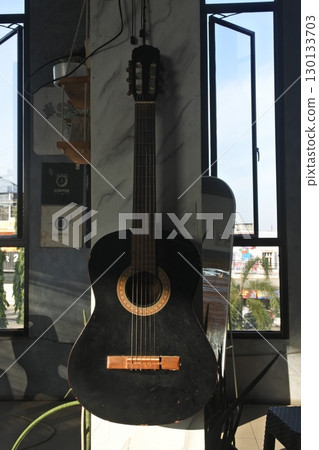 guitar hanging in the cafe guitar hanging in the cafe 130133703