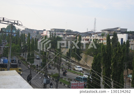 city view and green trees city view and green trees 130134262