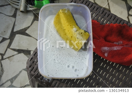 washing powder in a plastic box 130134913