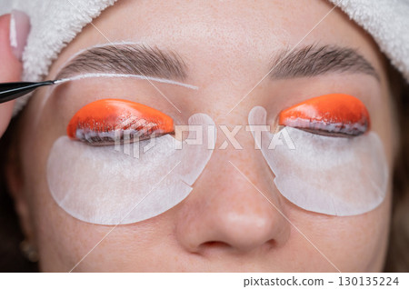 The process of professional lamination and dyeing of eyelashes and eyebrows in the salon. The process of professional lamination and dyeing of eyelashes and eyebrows in the salon. 130135224