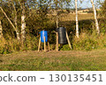Makeshift Pheasant Feeders in a Game Shooting Rural Location on a Summer Evening 130135451