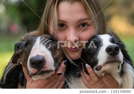 Joyful Moments with Two Adorable Dogs 130138000