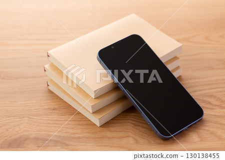 Paper books (paperbacks) and smartphones 130138455