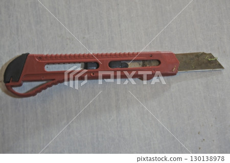 close up of a gun on a white wall 130138978
