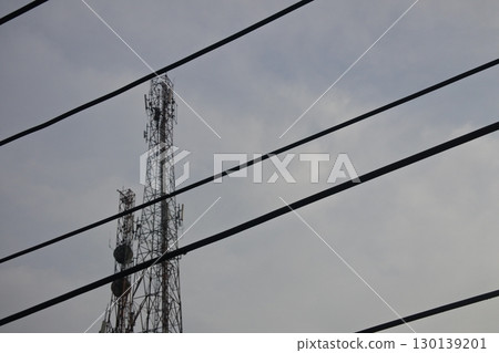 barbed wire fence with blue sky 130139201